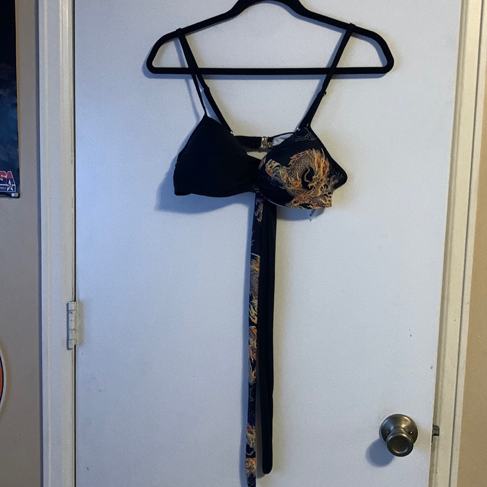 Very cute 3 piece swimsuit.  Never worn. Size large